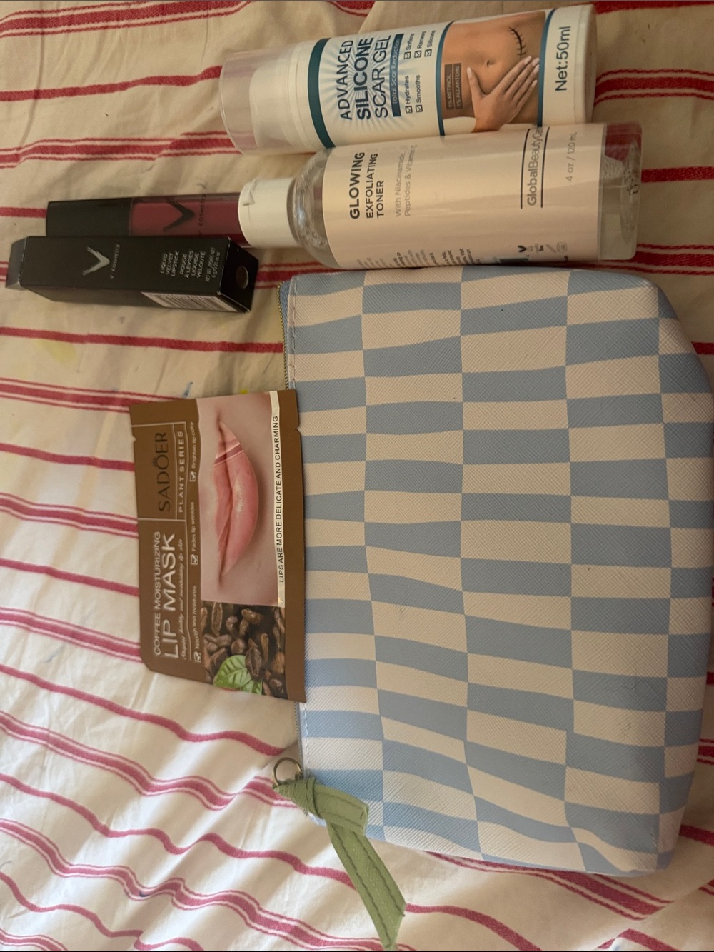 Blue & White Check Cosmetic Pouch with Skincare and Lip Products